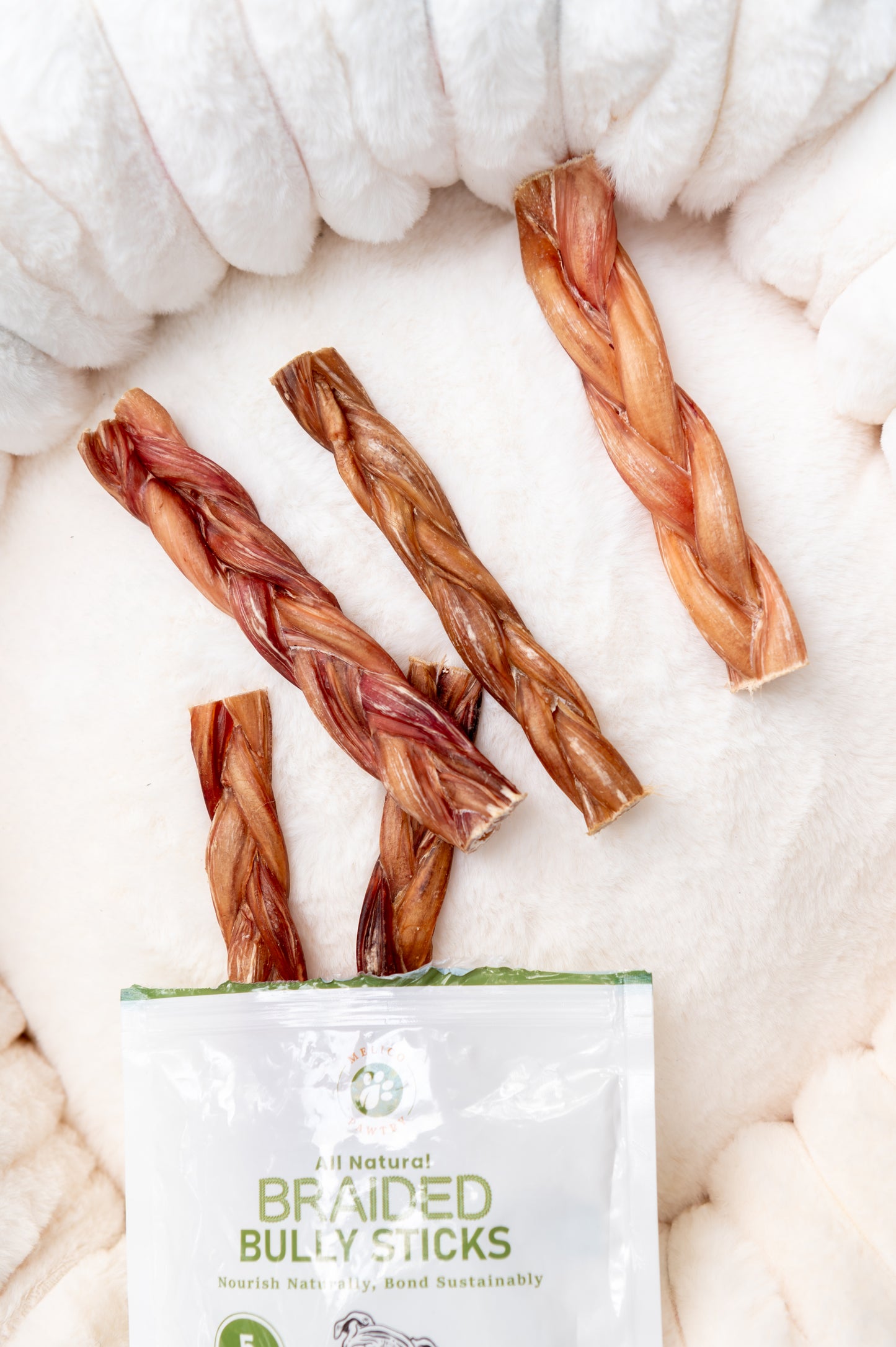 Braided bully sticks with a package labeled 'Braided Bully Sticks' on a white background.